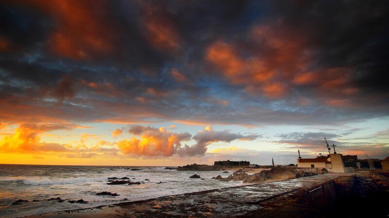 Coastal Sunset with Buildings