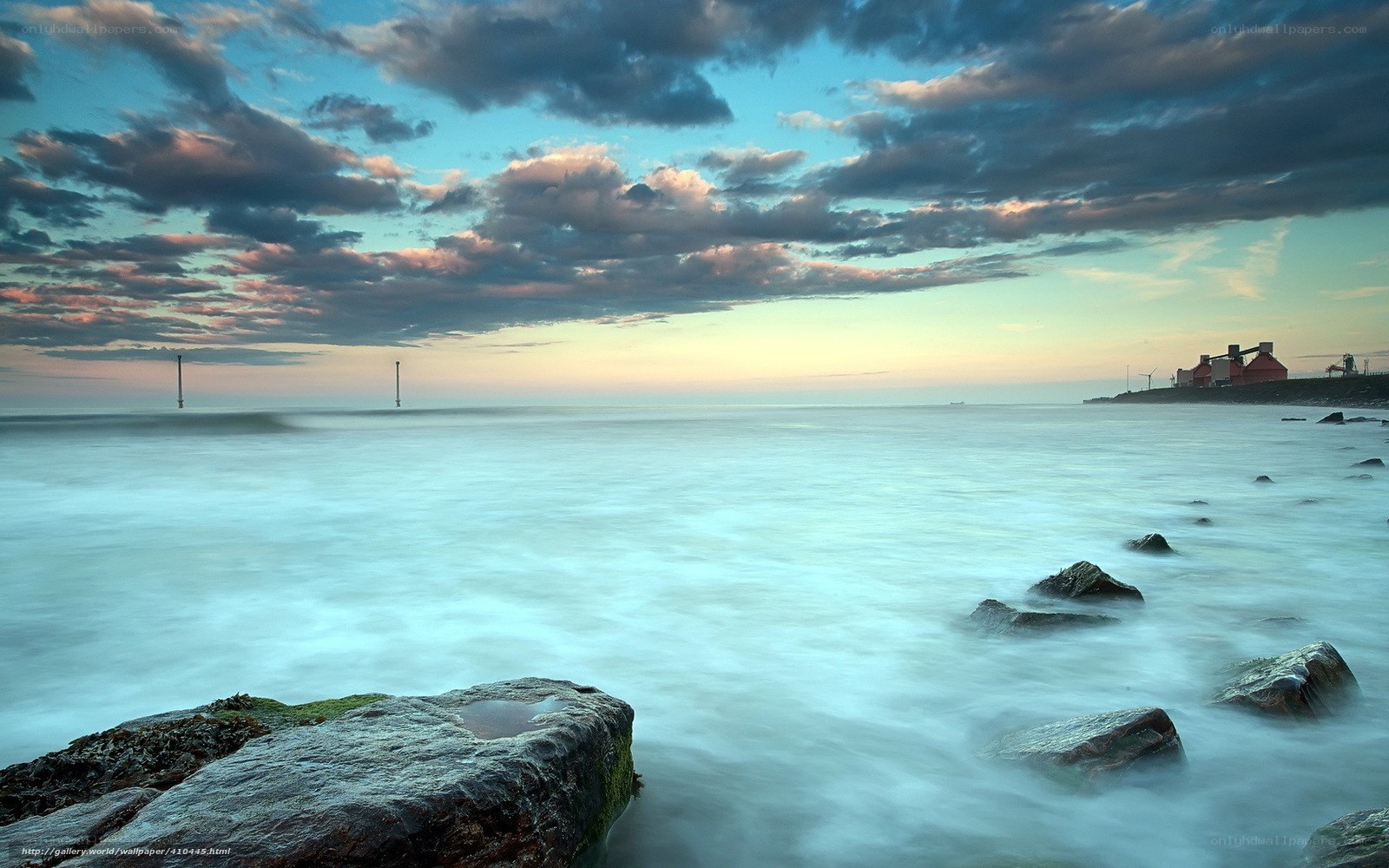 Coastal sunset with calm sea