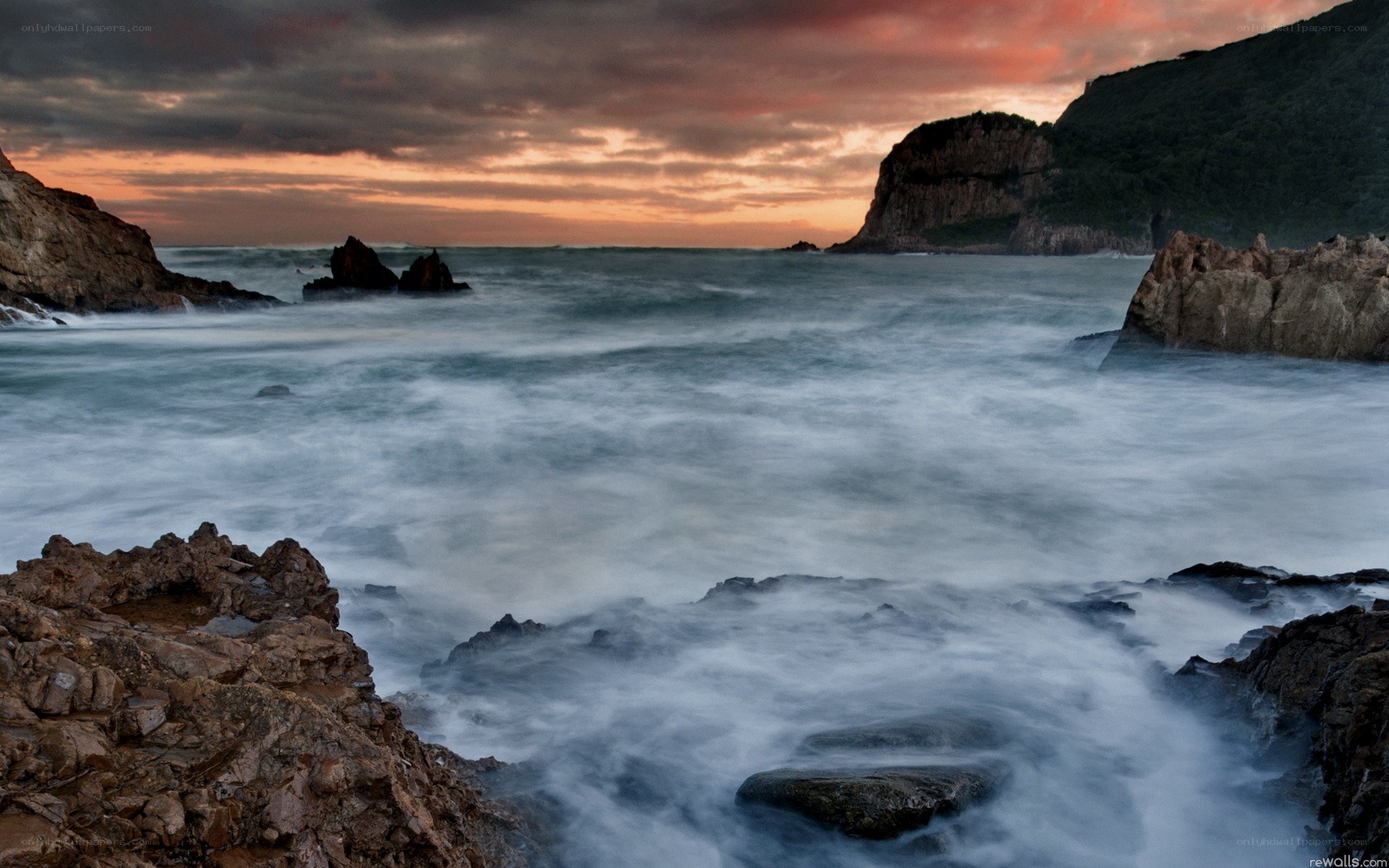 coastal sunset with crashing waves
