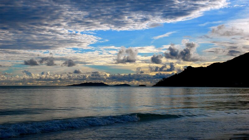 Coastal sunset with islands