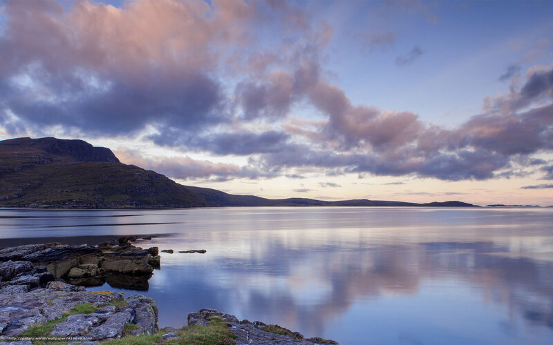 coastal sunset with mountain reflection