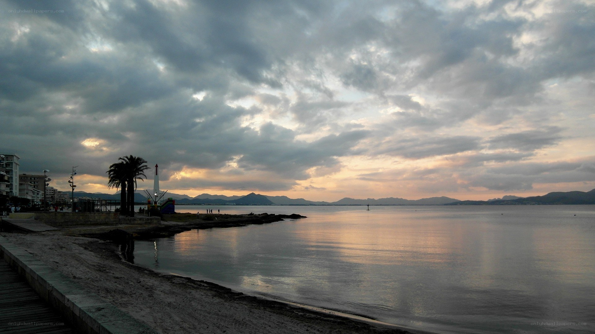 coastal sunset with mountains