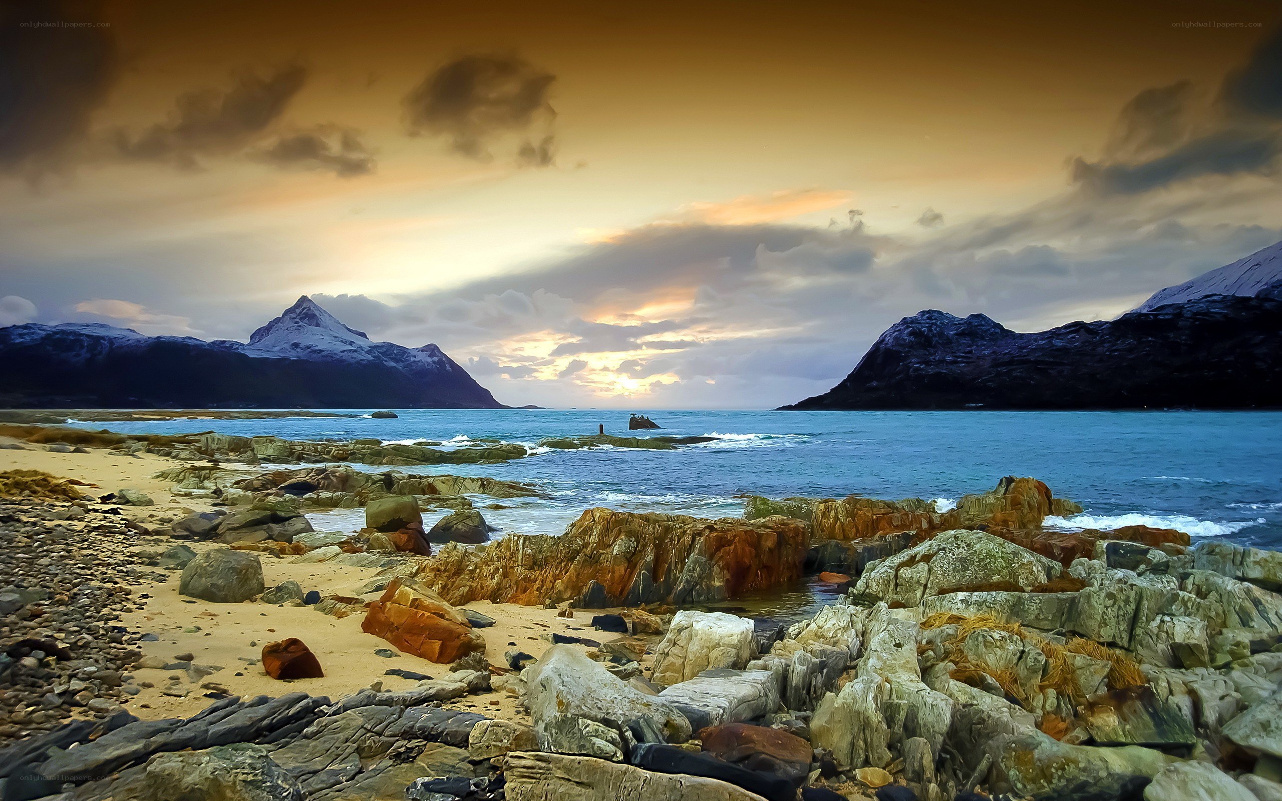 coastal sunset with mountains