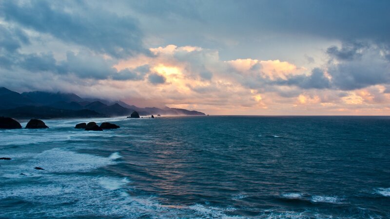 coastal sunset with rocky shore