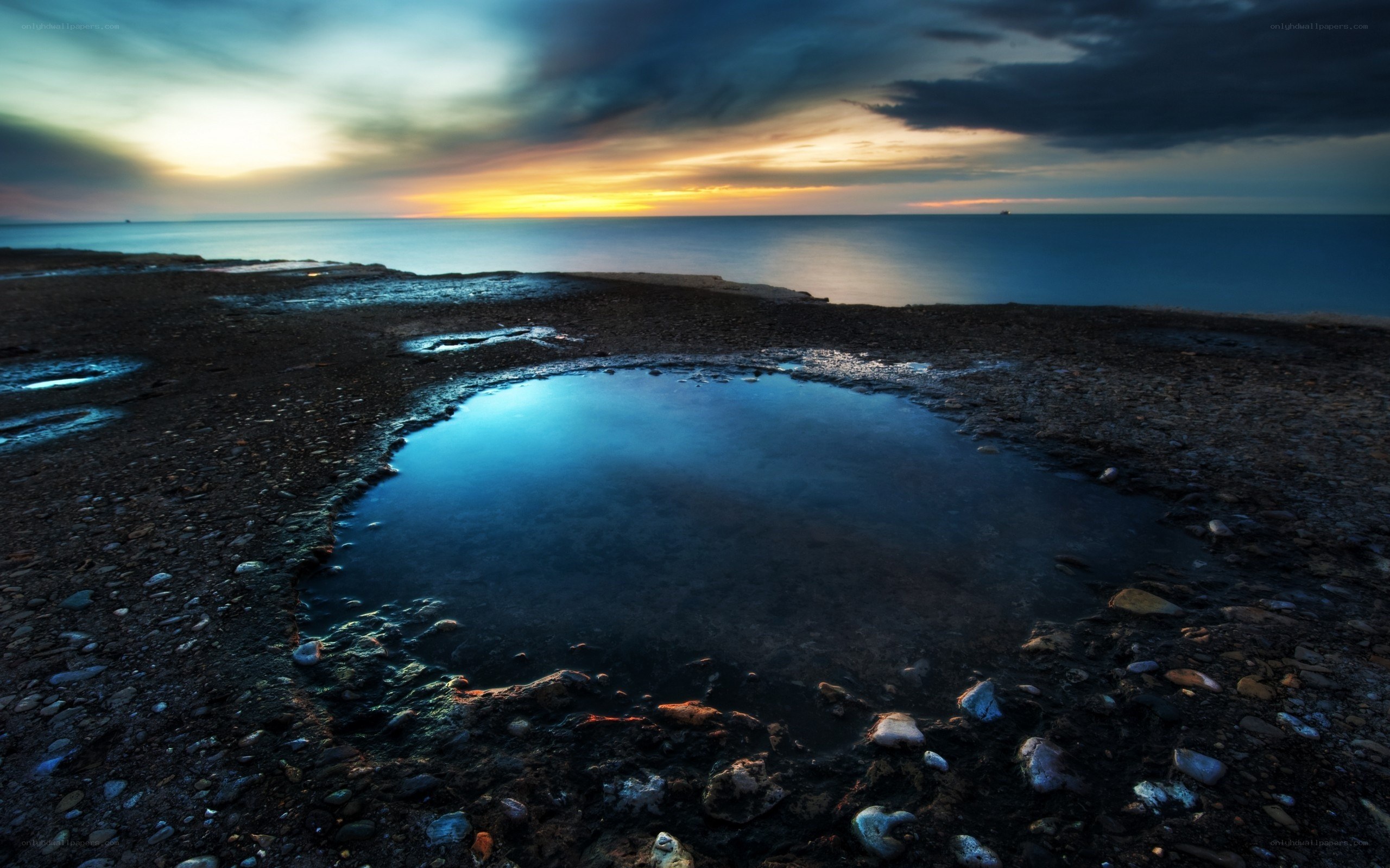 coastal tide pool at sunset