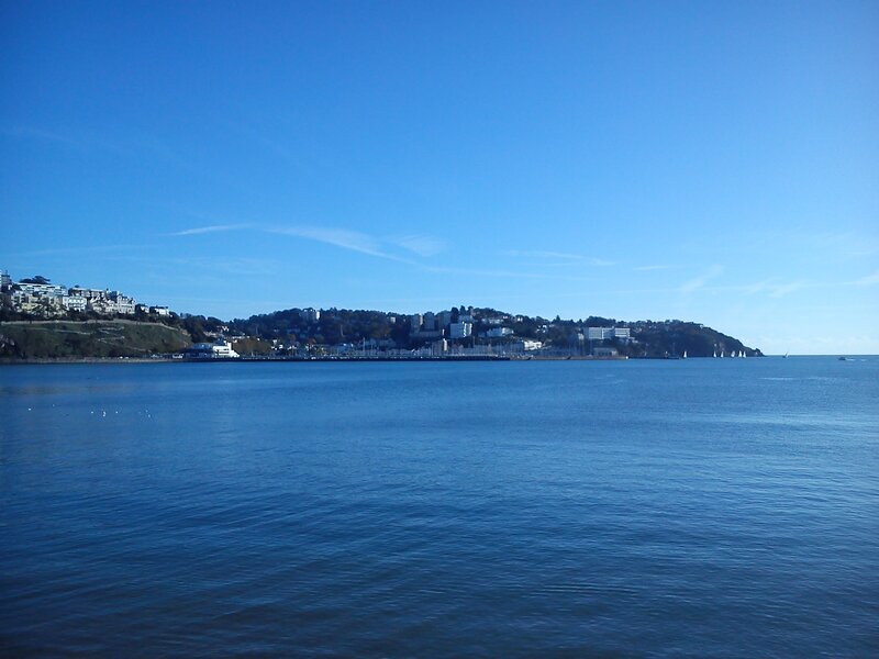 Coastal Town Across Water — Blue