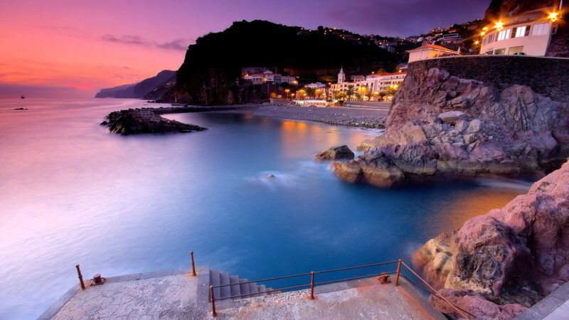 Coastal Town at Dusk — Purple, Serene, Sunset, Photograph, Cliffs, Buildings
