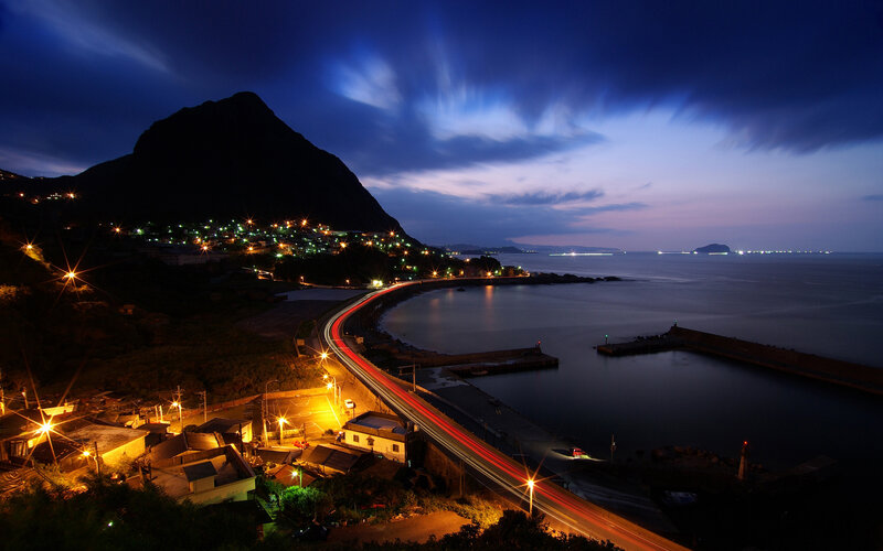 Coastal Town at Night — Blue, Dramatic, Photograph