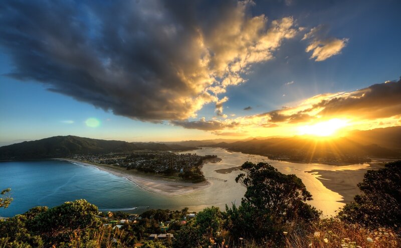 Coastal Town at Sunset — Blue, Dramatic, Photograph, Mountains, Beach, River