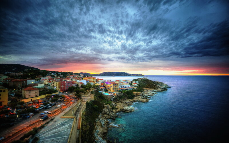 Coastal Town at Sunset — Blue, Dramatic, Photograph, Sea