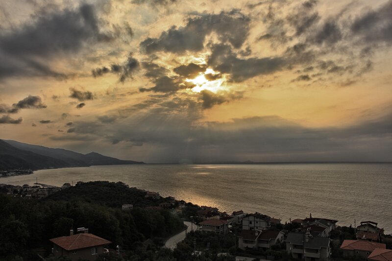 Coastal Town at Sunset — Gold, Dramatic, Photograph