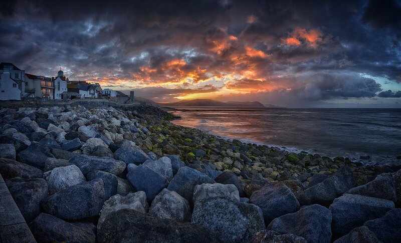 Coastal Town at Sunset — Orange, Dramatic, Photograph, Rocks