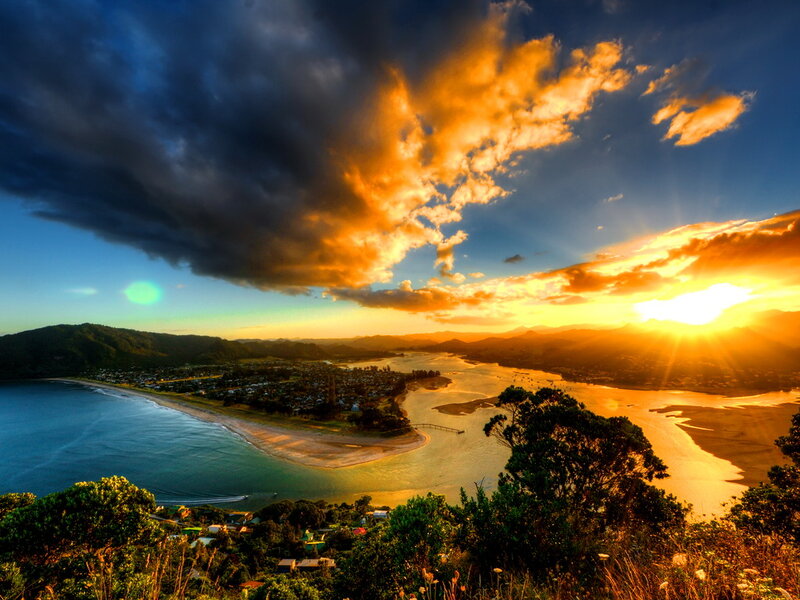 Coastal Town at Sunset — Orange, Dramatic, Photograph
