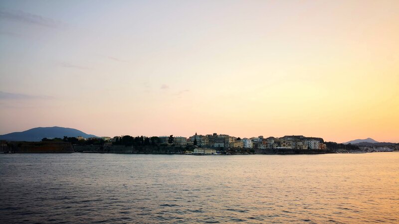 Coastal Town at Sunset — Orange, Serene, Photograph, Sea