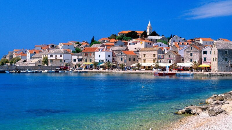 Coastal Town by Sea — Blue, Serene, Afternoon, Photograph, Buildings
