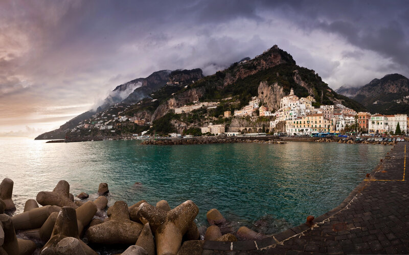 Coastal Town on Cliff — Blue, Dramatic, Sunset