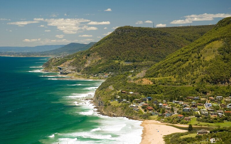 Coastal Town on Cliff — Blue, Serene, Afternoon, Photograph, Ocean, Beach