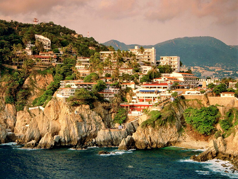 Coastal Town on Cliff — Blue, Serene, Sunset