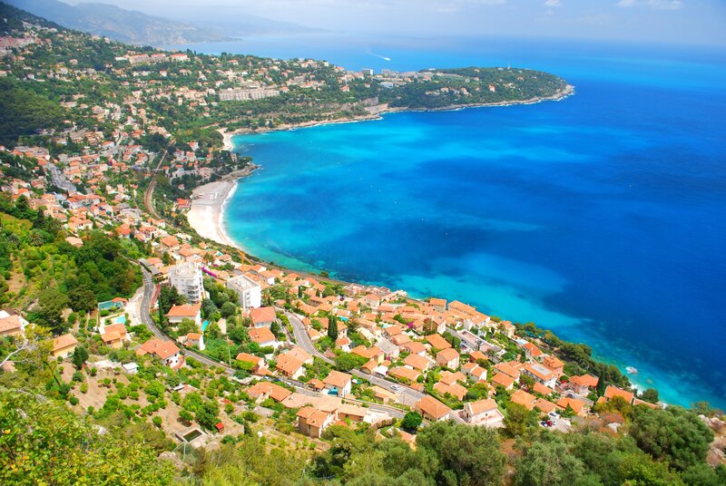Coastal Town on Hillside — Blue, Serene, Afternoon, Photograph, Houses