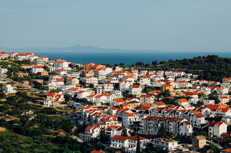 Coastal Town on Hillside — White