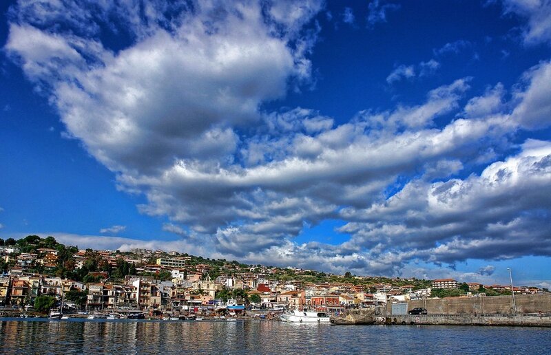 Coastal town under cloudy sky