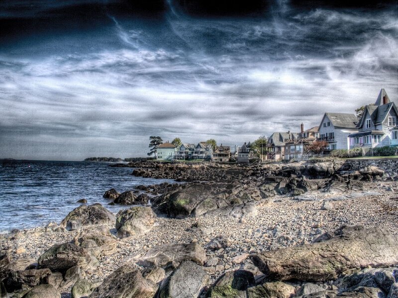Coastal town under dramatic sky