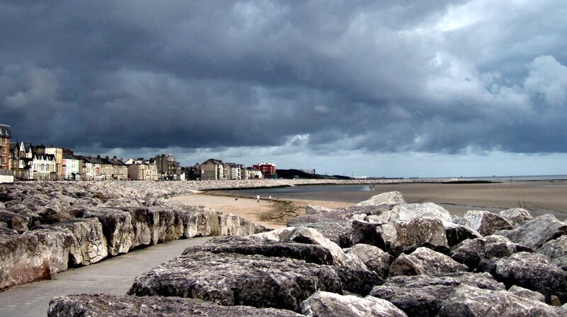 Coastal Town under Storm Clouds — Gray