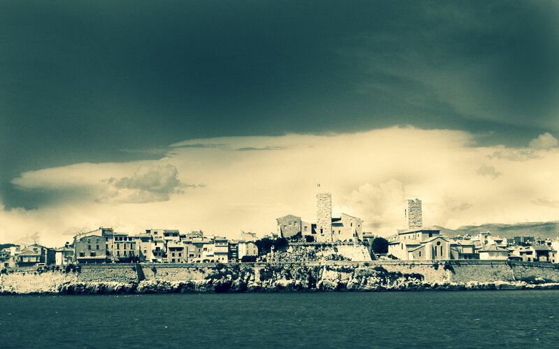 coastal town under stormy sky