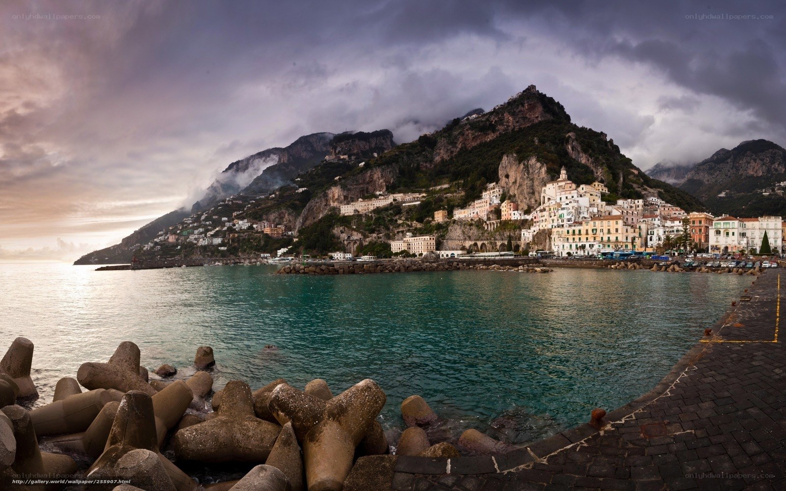 coastal town under stormy sky