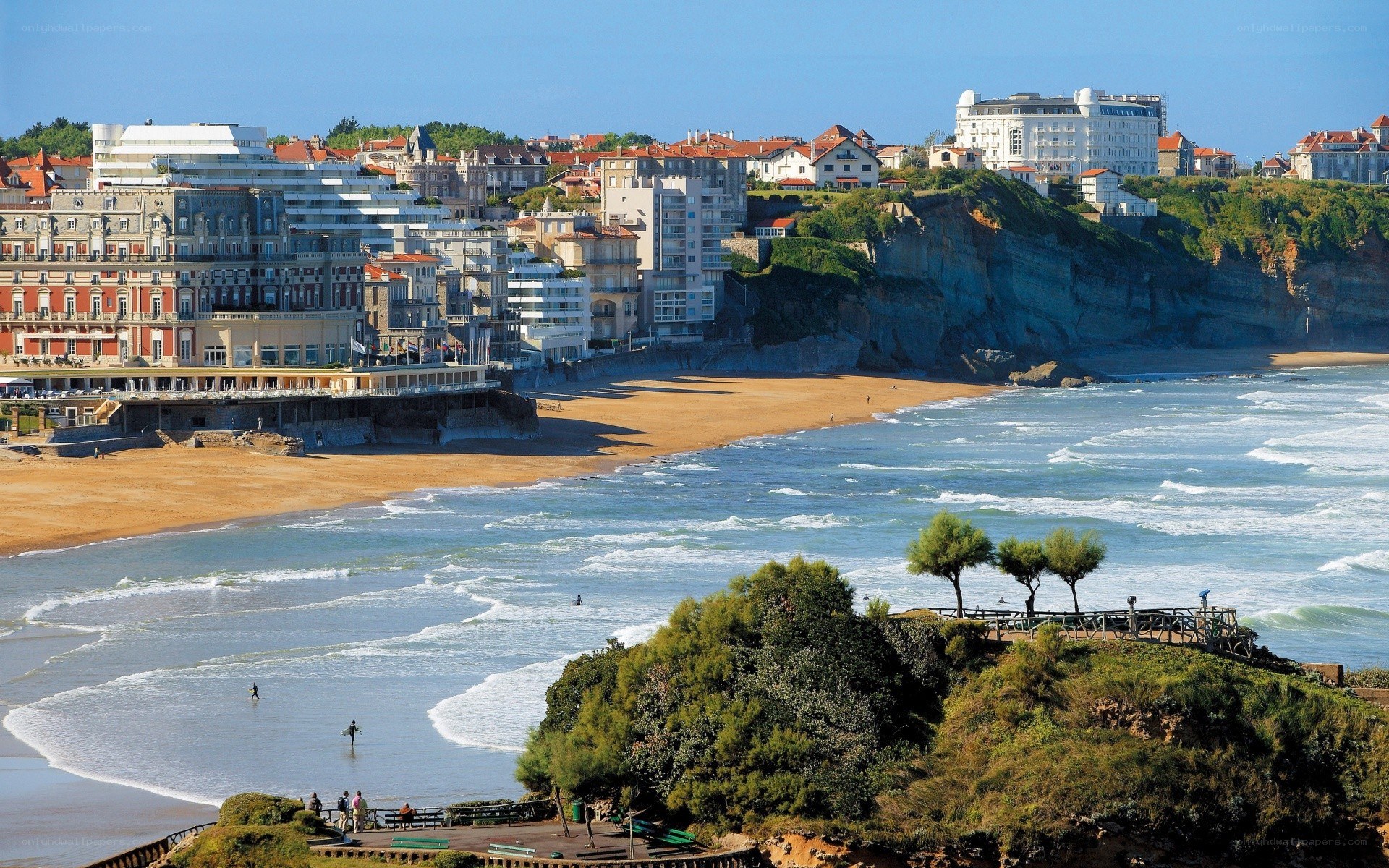 coastal town with beach and cliffs
