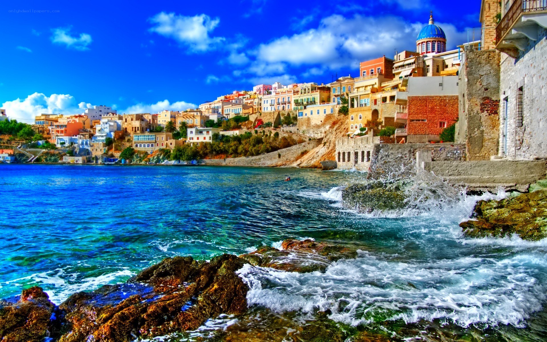 Coastal town with blue dome