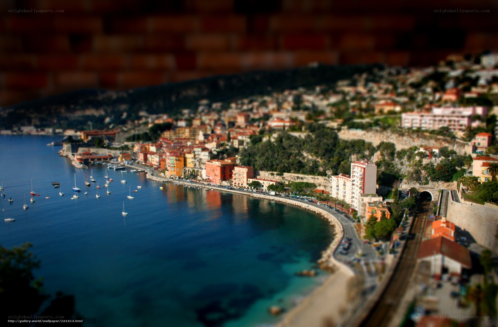 coastal town with boats and buildings