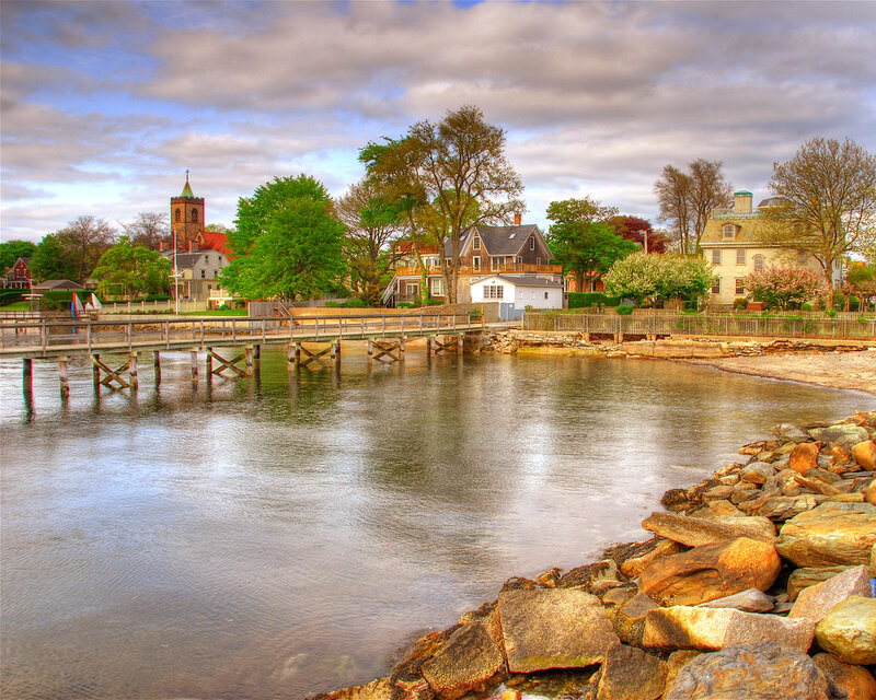 Coastal town with church and pier