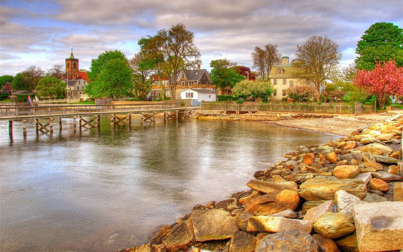 Coastal town with church and pier