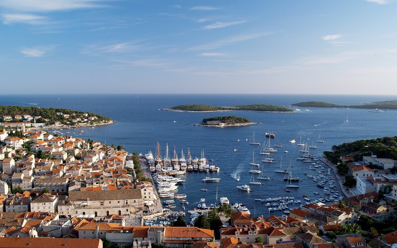 Coastal town with harbor and boats