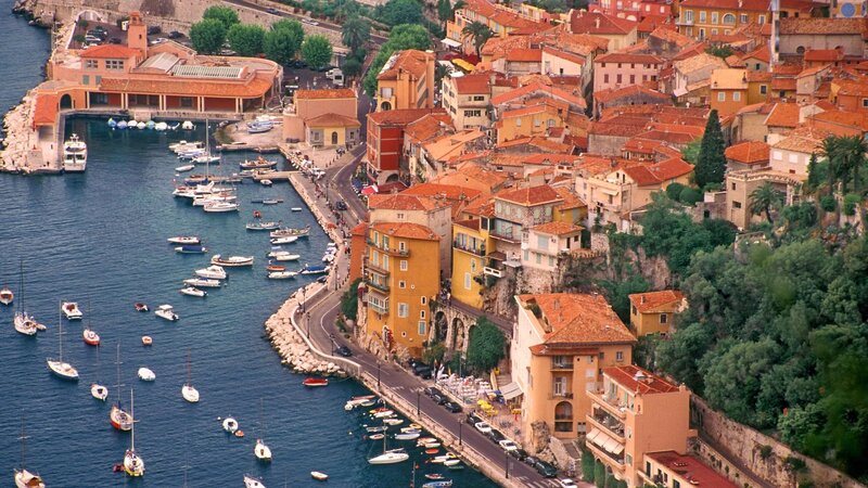coastal town with harbor and boats