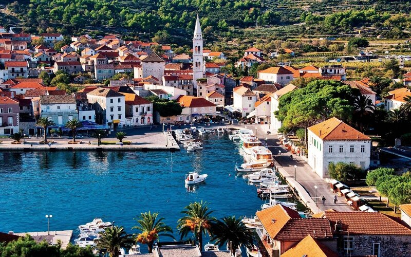Coastal town with harbor and church