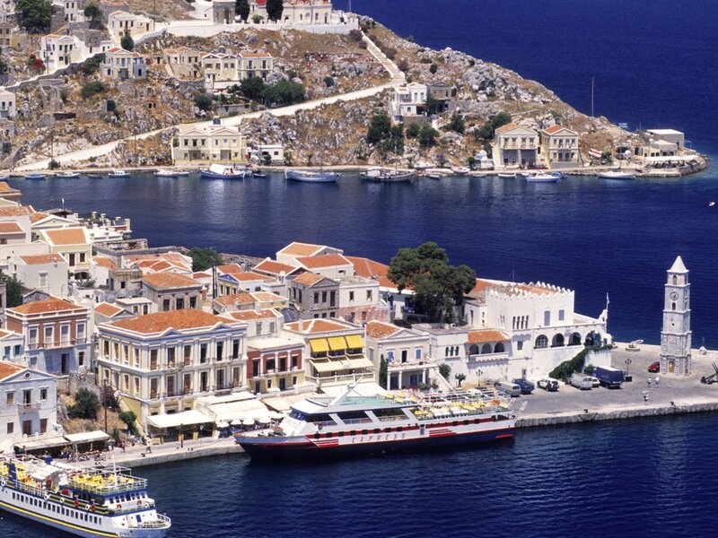 Coastal town with harbor and ferry