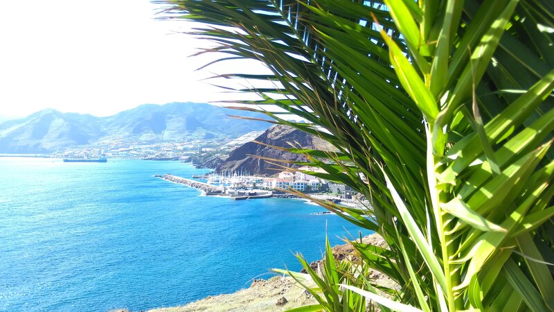 Coastal Town with Harbor — Blue, Serene, Afternoon, Photograph, Mountains, Sea