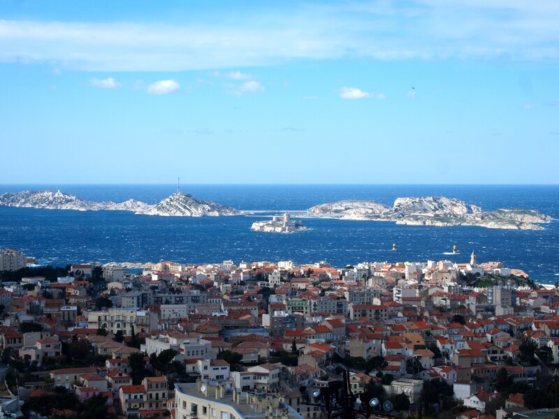 coastal town with islands in the distance