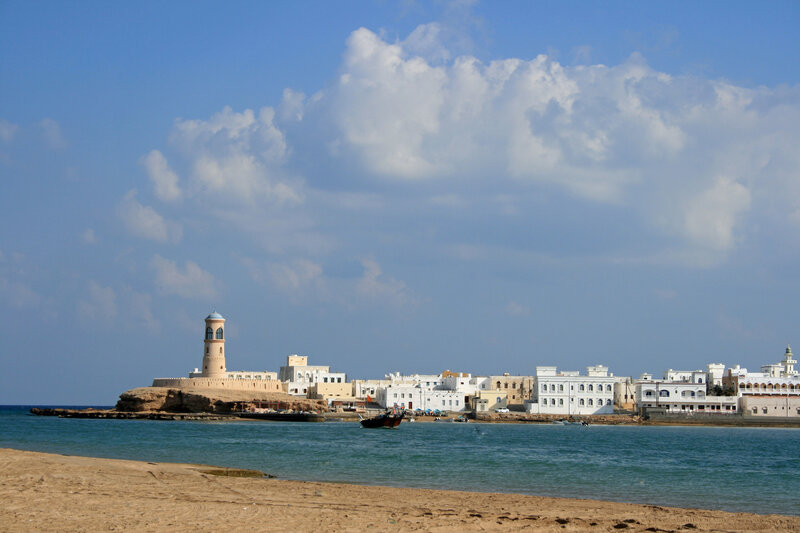 Coastal town with lighthouse