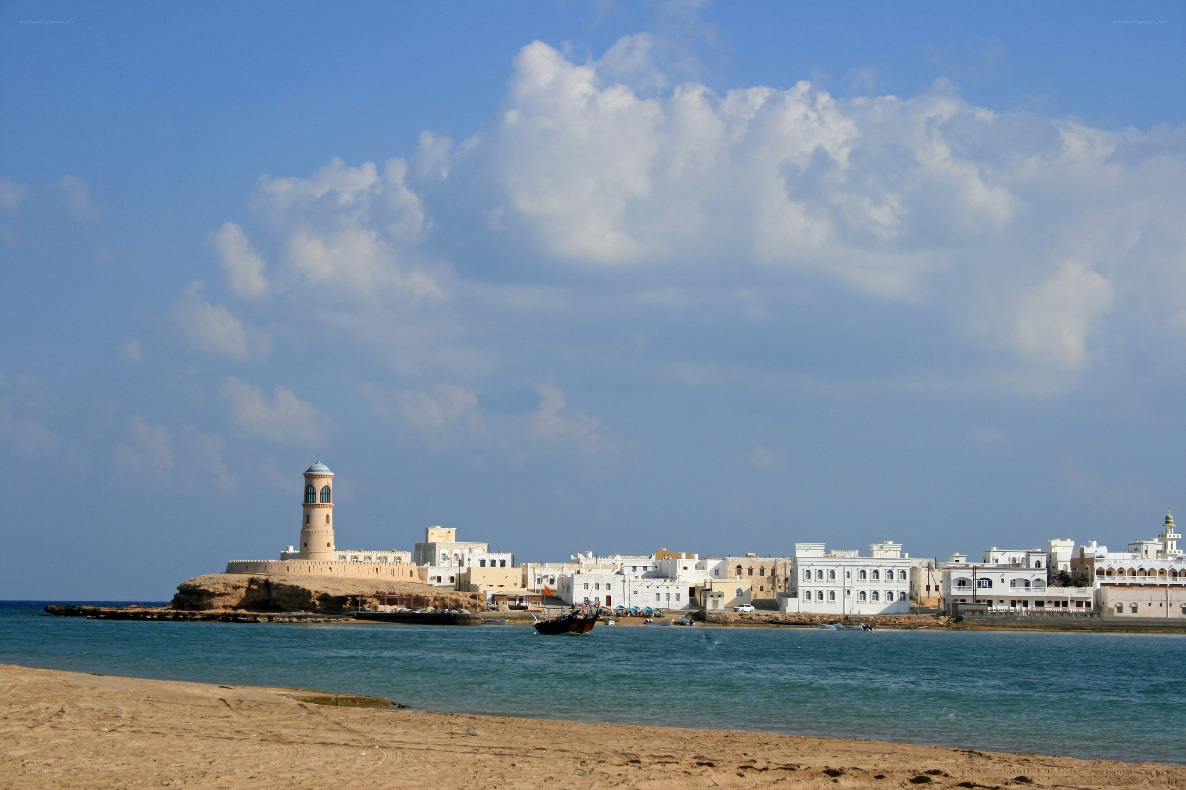 Coastal town with lighthouse