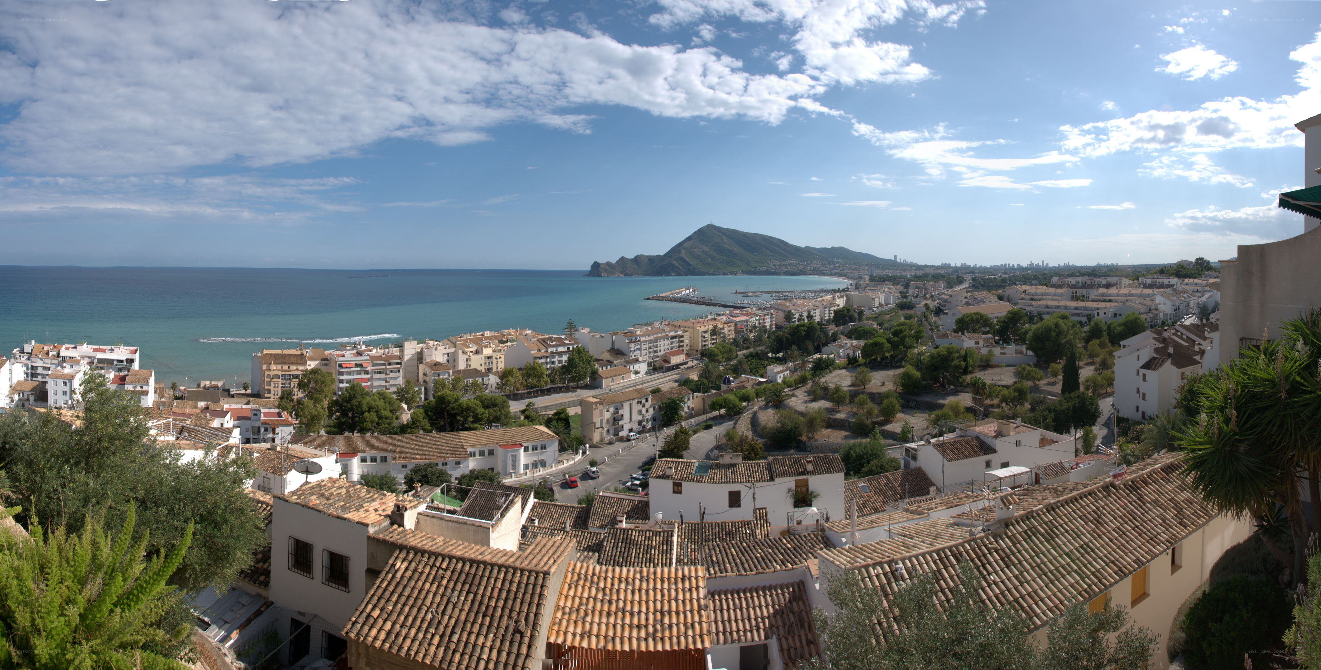 coastal town with mountain view