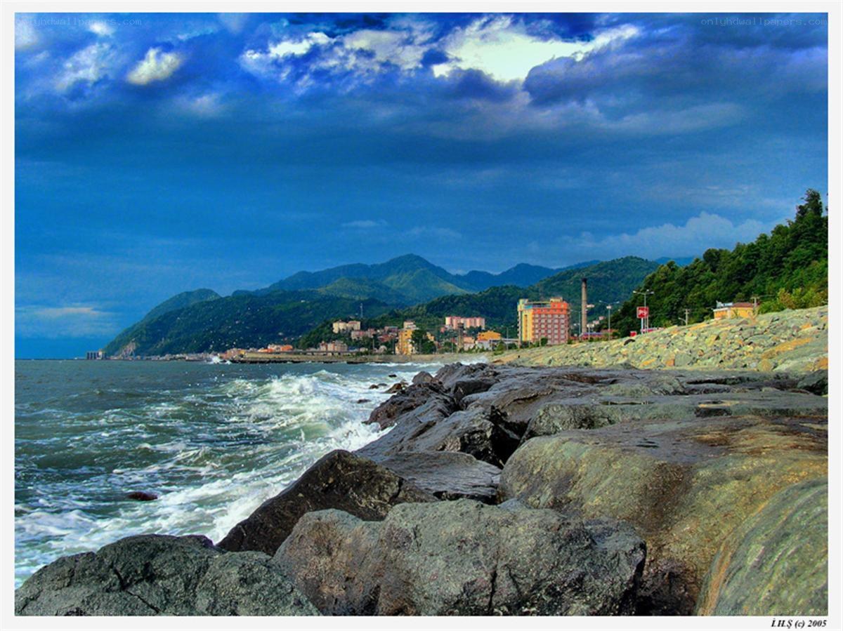 Coastal town with mountains
