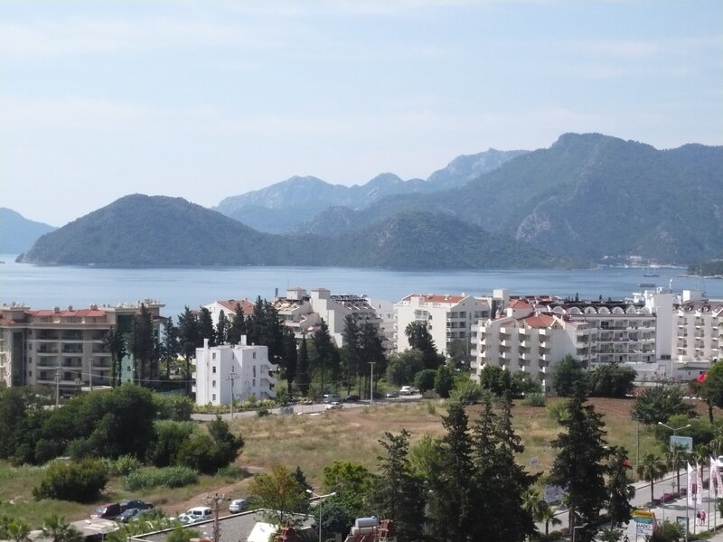 Coastal Town with Mountains — Blue, Serene