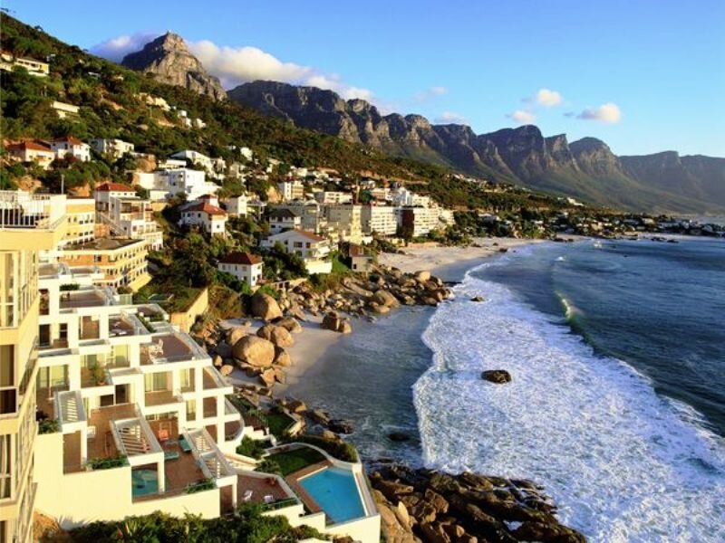 Coastal Town with Mountains — Blue