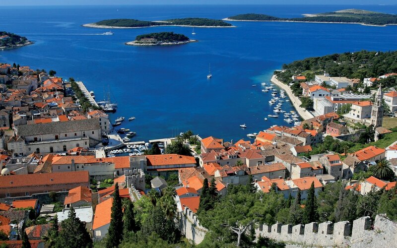 Coastal town with red-roofed buildings