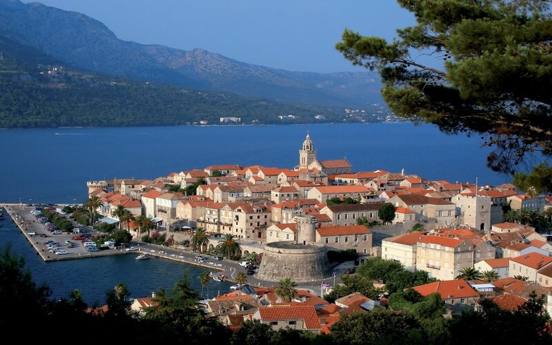 coastal town with red-roofed buildings
