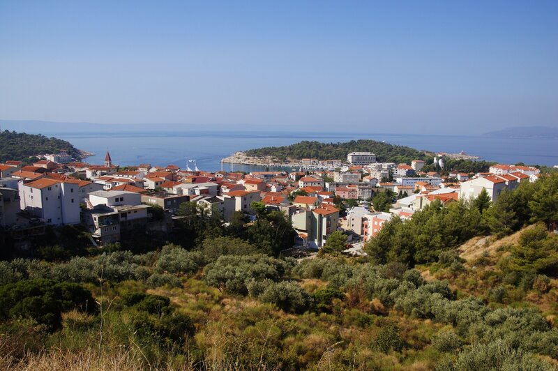 Coastal town with red-roofed buildings