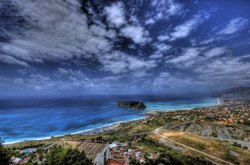 Coastal town with rocky island